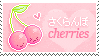 A stamp with pink cartoon cherries.